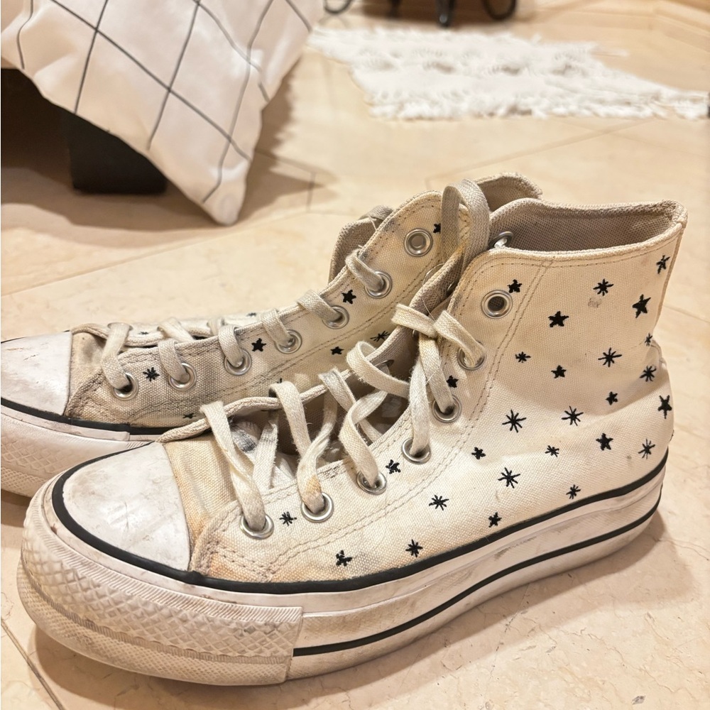 Star high top converse with purple bottom